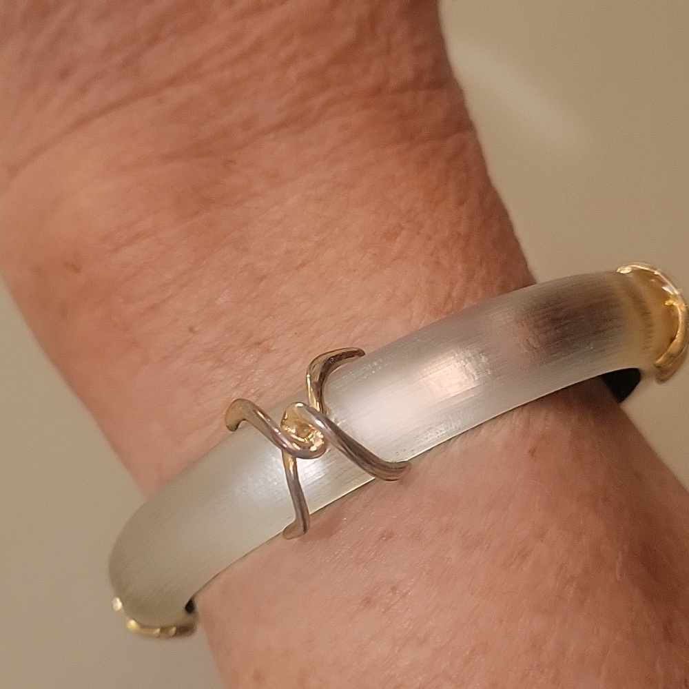 Alexis Bittar white hinge bracelet with gold trim